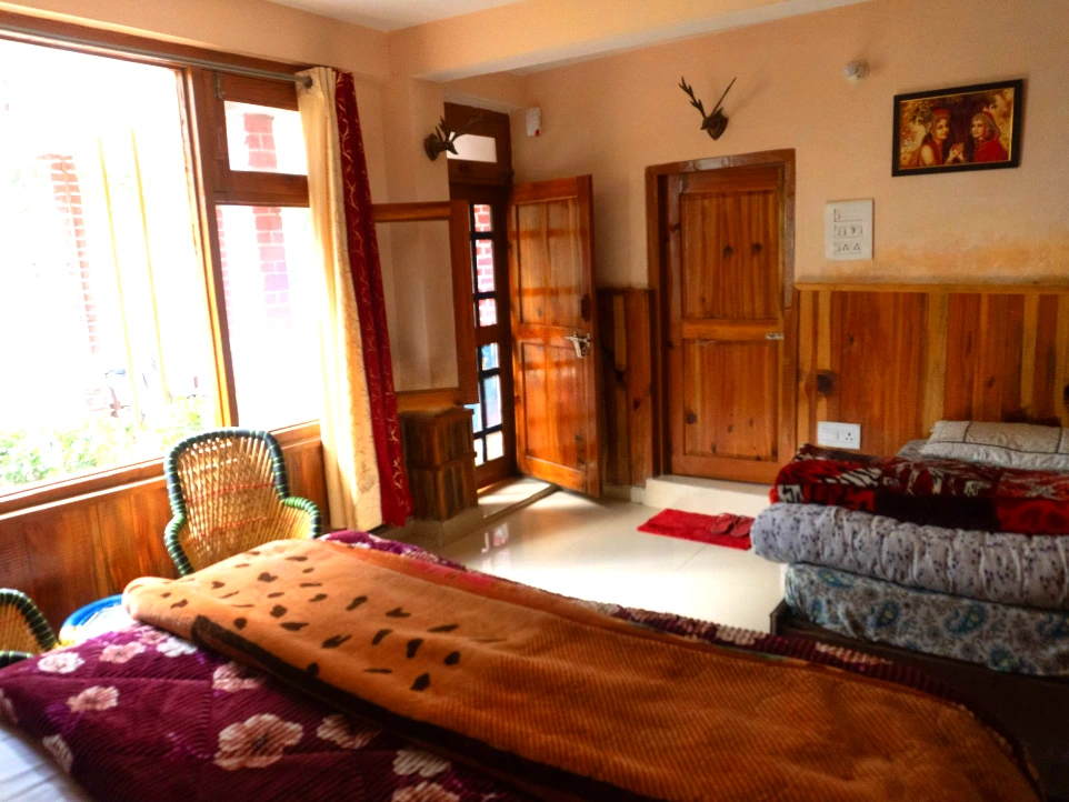 Mountain view room with private balcony at Tirthan Midpoint Homestay