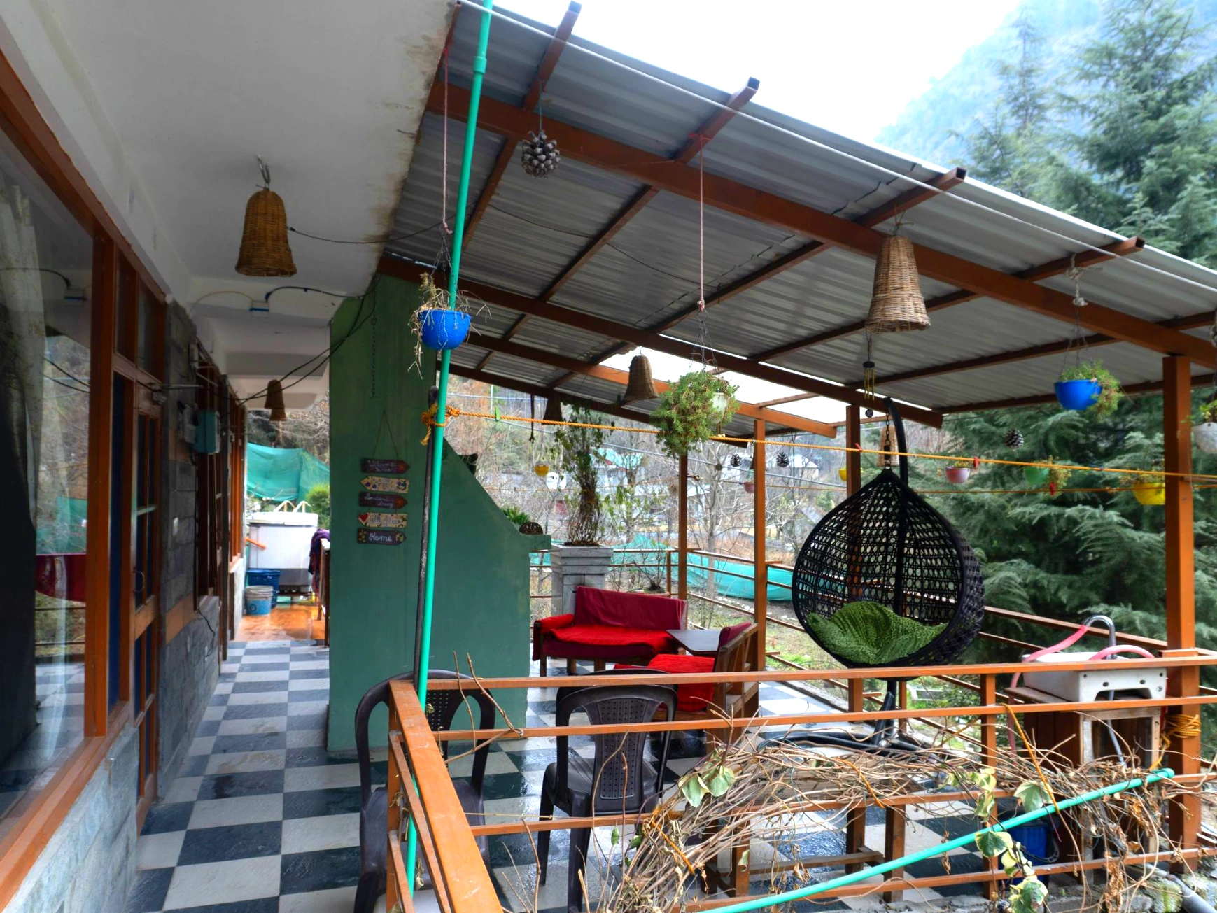 Mountain view room with private balcony at Tirthan Midpoint Homestay